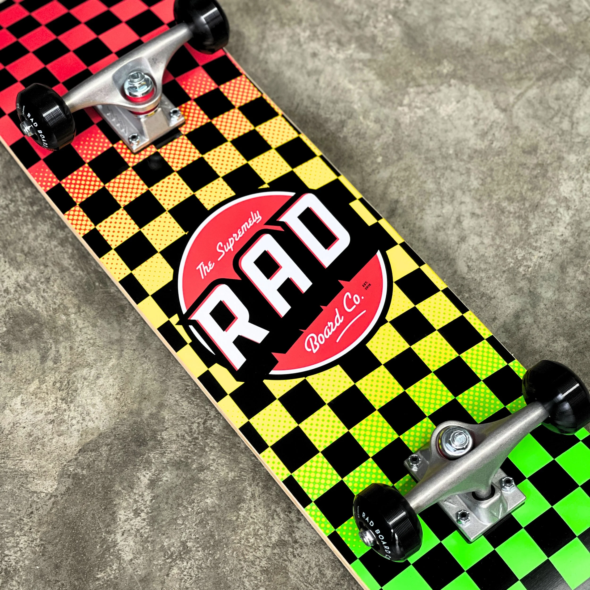 RAD BOARD CO. COMPLETE DUDE CREW CHECKERS RASTA FADE 8“ — SURF TRAX™